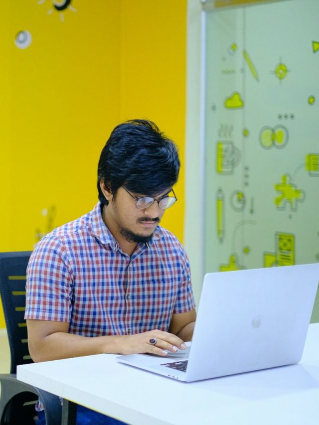 Young Man working on laptop