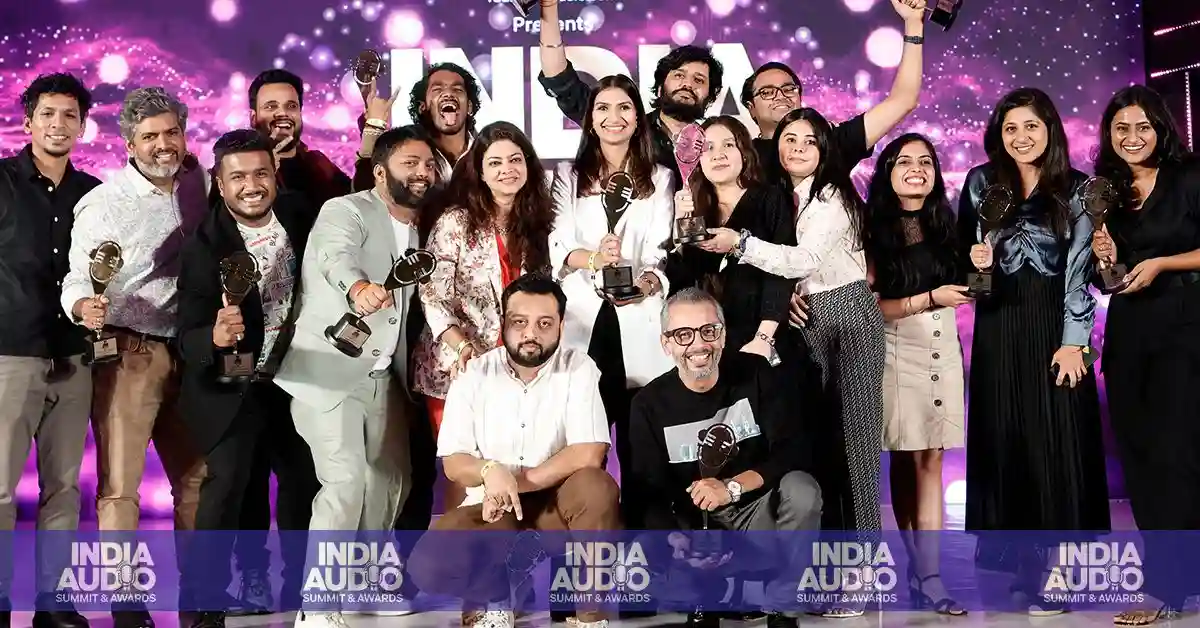 a group of audio award winners posing for a photo