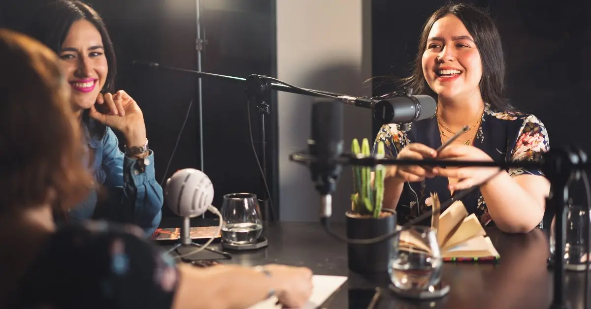 A group of young women podcasting